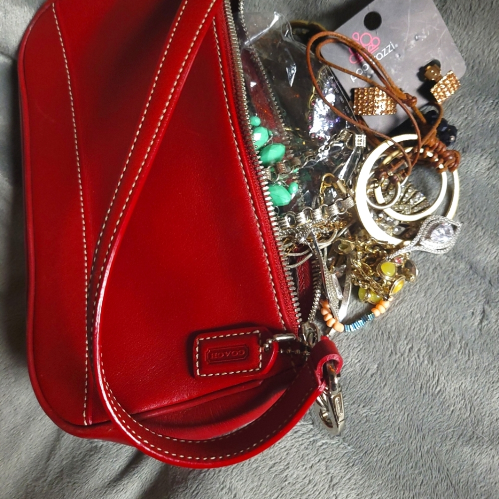 Coach handbag filled with jewelry